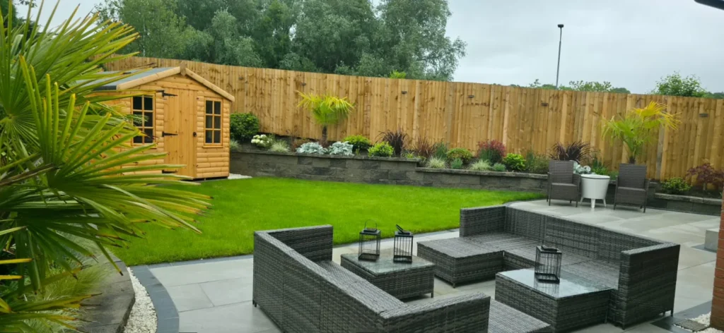 Garden transformation by RS Bespoke Gardens with new lawn, patio and summerhouse